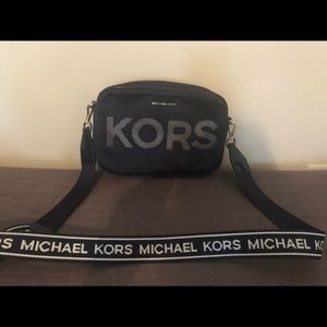Medium dark blue michael kors bag white kors logo